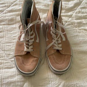 Pink suede high top Vans sneakers